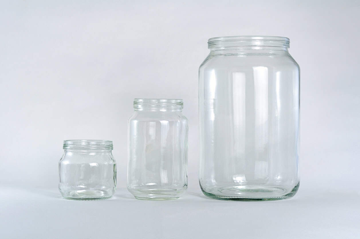 three different size glass jars