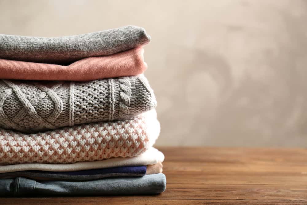 stack of folded women's clothes