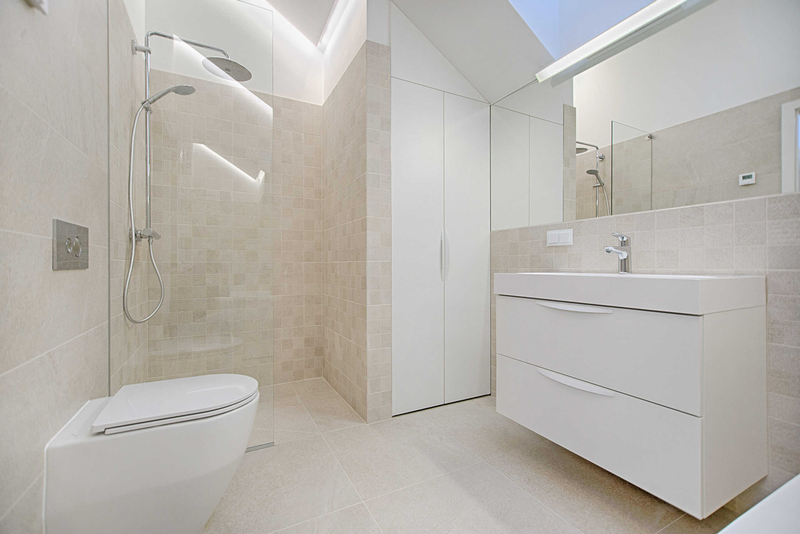 Modern looking tan bathroom