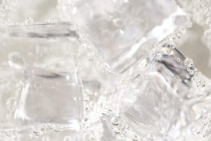 close-up-of-ice-cubes-in-water-with-bubbles