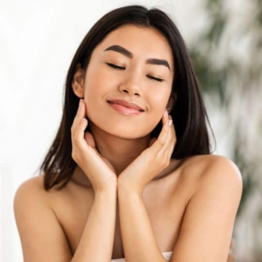 beautiful woman with soft skin and silky hair