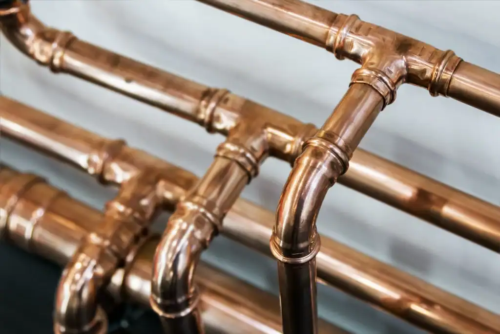 a group of copper pipes