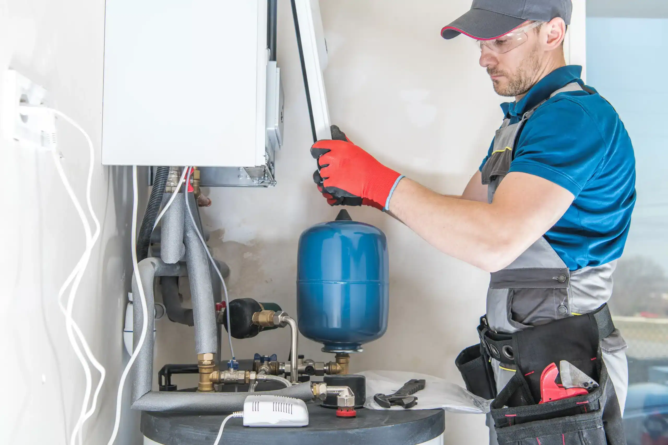 furnace installation by worker