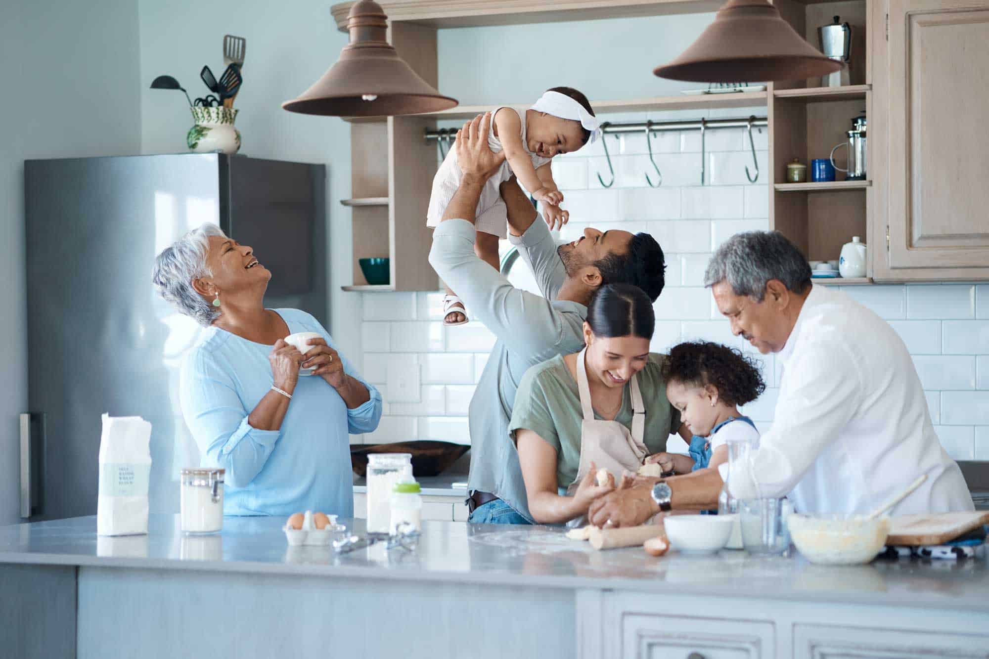 large multigenerational family in their kitchen