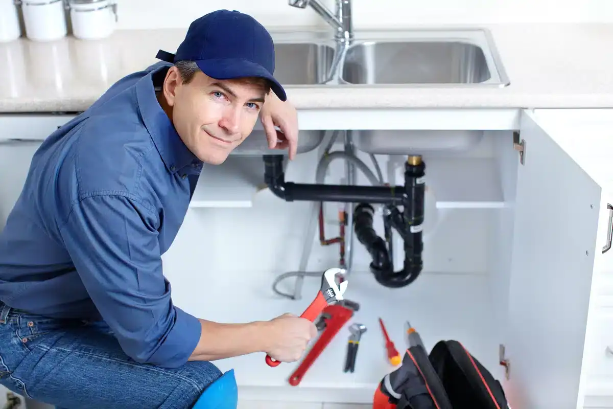 smiling plumber