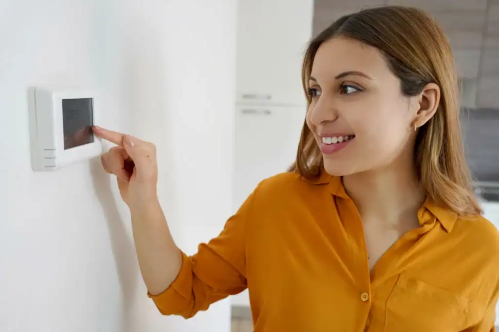 adjusting thermostat and temperature