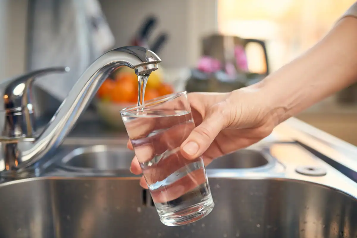 woman filling fresh water