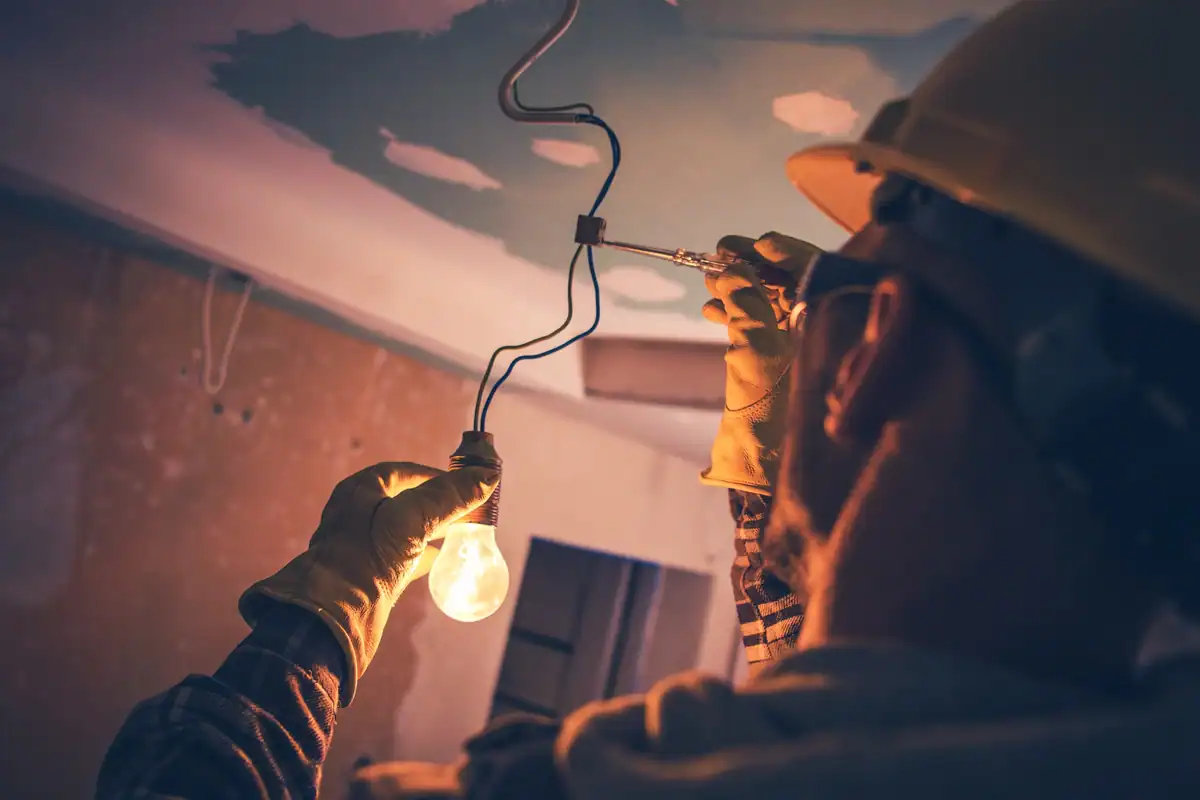 Siren's Electrician repairing an outlet