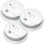 Image of three white smoke detectors arranged in a triangular formation. Each smoke detector has a round shape with a central button and vented openings. The devices appear identical and are shown against a plain white background.