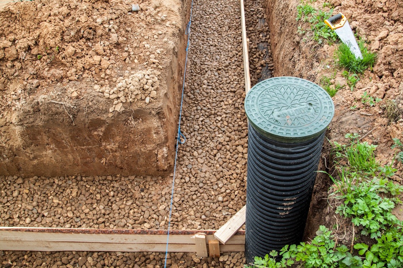 Inspection Well, Drainage Pipe And Trench With Formwork, Which Is Prepared For Pouring The Foundation