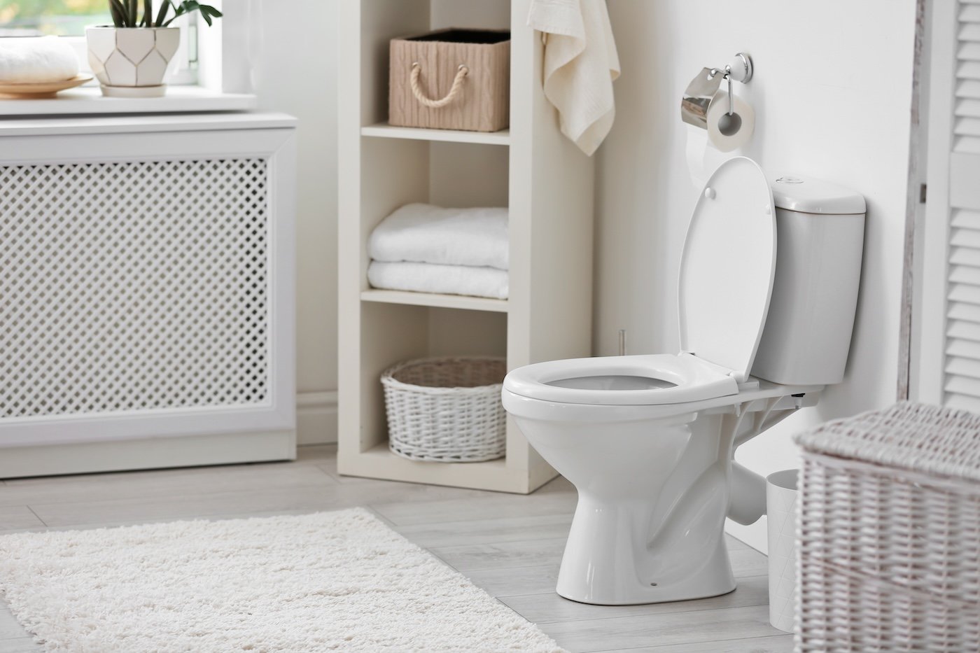 Toilet Bowl In Modern Bathroom Interior