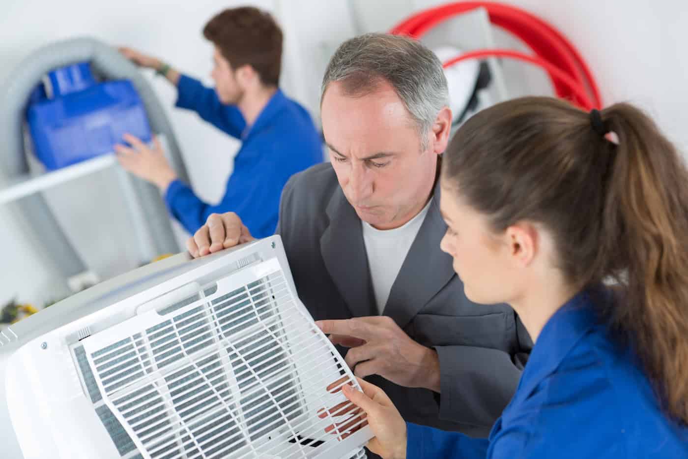 Students Learning About Air Conditioning Unit