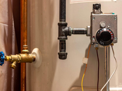 Hot water heater maintenance and safety check that pilot is working